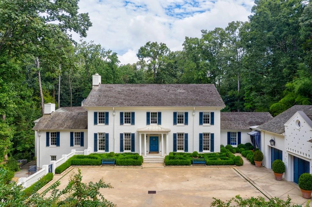 New Price on this Tuxedo Park gem! Located on one of the most desired streets in Buckhead, the home is fully renovated complete with freshly painted white interiors throughout. The main floor features a large open and spacious floor plan with light filled floor to ceiling windows and French doors leading out to the heated saltwater pool with fountains surrounded by a beautiful English garden. The generous master on the main is comprised of a cozy seating area, large walk-in closet, master bath with vanities, soaking tub and shower. The patio off of the master allows for further enjoyment of the outstanding view which is most definitely a sight to behold. The Chef’s kitchen, with state of the art appliances, large island and incredibly functional cabinet and storage spaces are ideal for day to day living and for entertaining large or small groups. The upstairs is comprised of four beautifully appointed bedrooms each with its own full bath and custom closet. The terrace level features a guest suite, wine room, game room, large laundry room and excellent storage space. There is ample parking with the three car garage and well-designed motor court. The area above the garage allows room for expansion with a separate apartment, au pair suite, play room or office. The walk-out backyard with pool, cabana and gardens accentuate this amazing property.