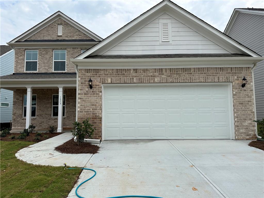 $500 OFF FIRST MONTH'S RENT! Located in the sought after Mill Creek school district, this stunning home has an open floorplan with the primary bedroom, sunroom, office, laundry, and powder room on the main floor. The second floor features 3 bedrooms, 2 full baths, and a large loft area. Hardwood flooring on main level and well maintained carpet on the second. Contemporary kitchen with fresh looking countertops and cabinets. Appliances are stainless steel. The family room, primary bedroom, and loft are pre-wired with media outlets. Neighborhood amenities include a playground, tennis court, and swimming pool. Easy access to I-85 and shopping (Mall of Georgia). 1-year lease minimum. Renter insurance required. Lawn mowing, landscaping/yard maintenance is tenant's responsibility.