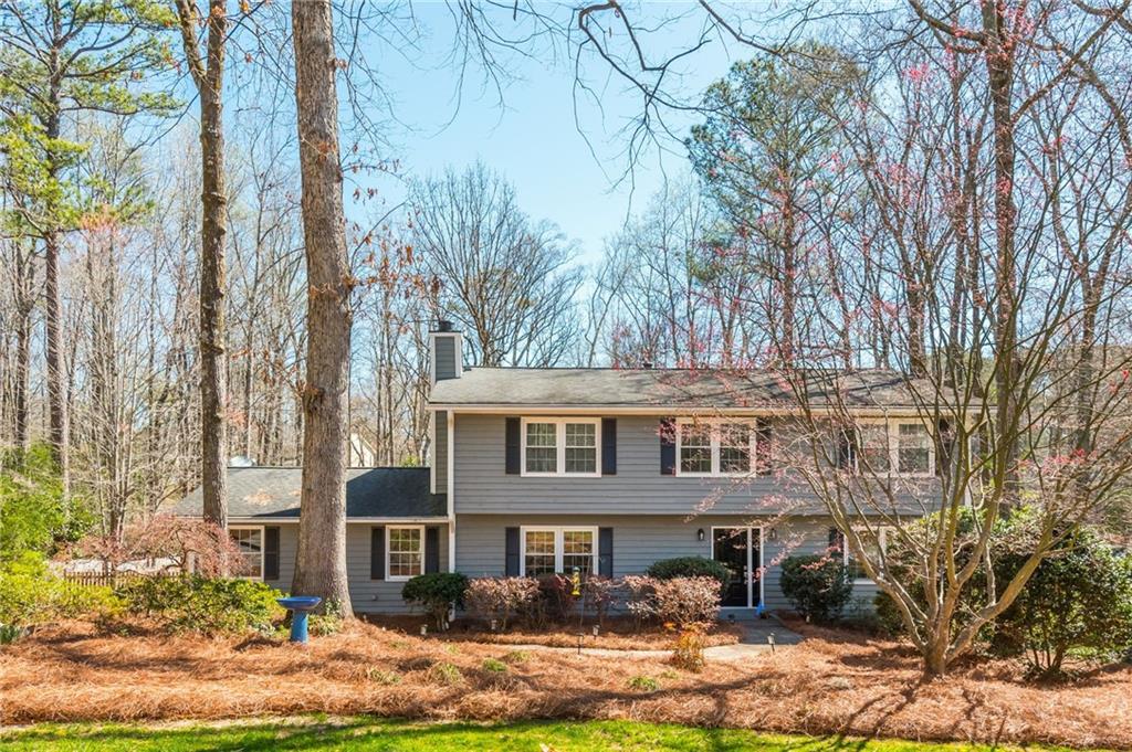 Meticulously Maintained, Completely Renovated and Gorgeous 5 Bedroom, 3.5 Bath Home with Full Finished Basement & AMAZING yard in sought-after Chimney Springs Swim & Tennis Community in East Cobb. Kitchen Features Custom Stained Cabinets, Farm Sink, Granite Counters and Island. Fantastic Master Suite with ENORMOUS Master Closet and stunning Ensuite Bath includes Custom Cabinets, Granite Counters and Custom Shower. Three additional Secondary Bedrooms and Full Bath Upstairs. Hardwoods throughout Main Level. Large Deck with spacious Private Screened Porch great for entertaining, Game Day or just relaxing and enjoying the Georgia seasons. Full Finished Basement with Bedroom, Bath, Game Area and/or Flex Space. Community features large clubhouse great for parties, playground, swimming, swim team, tennis, basketball, lake, fishing, green space for fun and sun as well as walking/hiking/biking paths. Very active and community with tons of social activities for adults and children year-round. Top Rated Schools! Tritt Elementary, Hightower Middle School and Pope High Schhol with an easy walk, stroll or roll to Tritt Elementary.