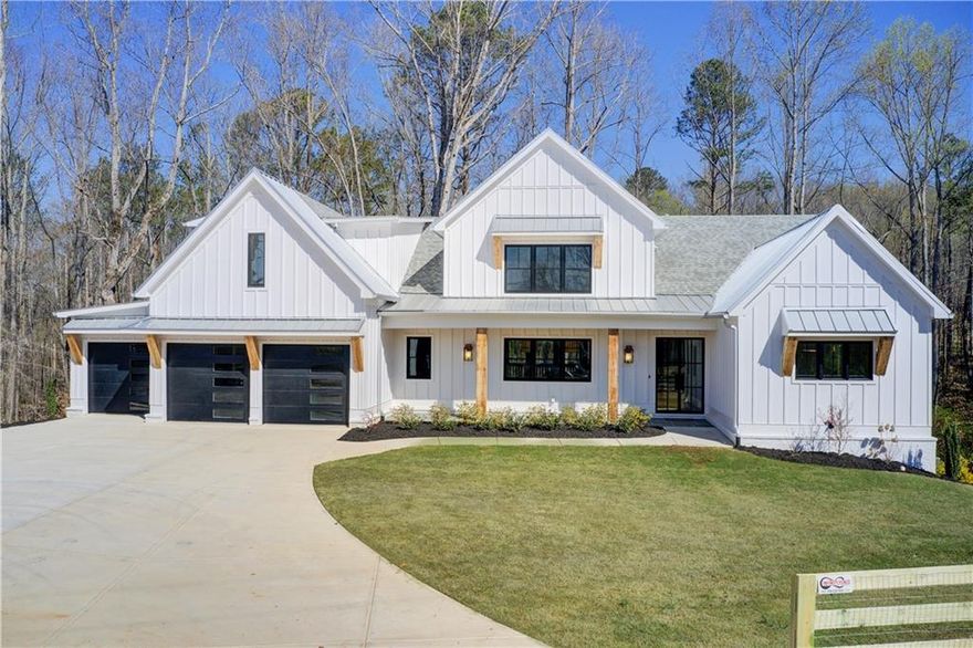 Welcome to this breathtaking modern farmhouse, where luxury meets functionality. With high ceilings, an open floor plan, and designer finishes throughout, this home offers the perfect blend of elegance and comfort.
The expansive kitchen is a chef’s dream, featuring high-end appliances, a massive island, and a hidden walk-in pantry. The owner meticulously selected premium materials, investing $250,000 in custom upgrades to elevate every detail of this home.
Unwind in the spa-like primary suite, complete with a steam shower and a massive walk-in closet. The finished basement boasts beautiful marble-finished baths, perfect for guests or additional living space.
Outdoor living is just as spectacular, with a half kitchen on the deck, ideal for entertaining. A three-car garage and 2.48 acres of serene land provide both space and privacy.
This recently appraised home offers approximately 7,700 sq. ft. of finished living space and is truly one of a kind. Don’t miss this rare opportunity!