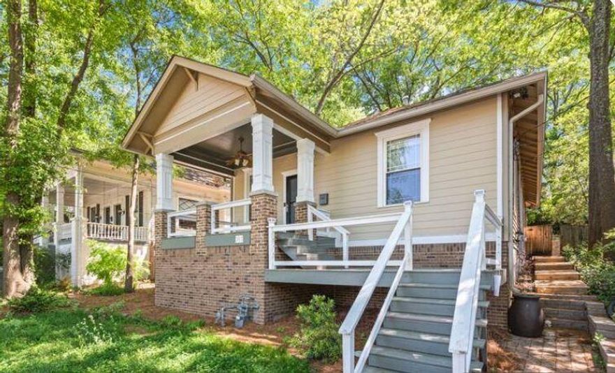 Beautifully updated bungalow tucked away in a quiet tree-covered Midtown neighborhood, close to all the hot spots in Atlanta! This home offers a large, open-concept living area as well as a double-sized owner's bedroom with oversized owner's bathroom and walk-in closet. The second bedroom is large with a nice closet, and has access to the bathroom in the main living area. Once inside, the home is all one level with walk-in shower.
The quiet, fenced backyard with pizza oven and fire pit cannot be beat! Great for entertaining! This gorgeous home is just a half a mile walk to all the hot spots: Piedmont Park, Ponce City Market, and the Fox Theatre. 
The walk-out basement is huge, with multiple rooms for storage. You can consider finishing the basement as a workshop or even as an income-generating ADU/Airbnb!