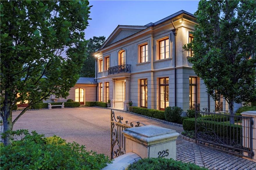 Discover an exquisite French-inspired mansion within walking distance to Buckhead Village. Formerly a Decorator’s Showhouse and featured in Veranda magazine, this estate embodies the French concept of a “Hotel Particulier,” offering grand, light-filled spaces and meticulous attention to detail.  Two gated entrances provide secure access to a private motorcourt framed by charming espaliered pear trees and a 3-car garage. This exceptional property represents absolute perfection, blending amazing construction detail, bespoke finishes, and the ultimate Buckhead lifestyle.
The private grounds spanning 1.3 meticulously maintained acres thoughtfully designed by Land Plus following the acquisition of the adjacent lot, display an idyllic and secluded sanctuary. Large screened patios overlook a verdant lawn that transitions into a turf soccer field. Hidden gems are a pickleball court with an integrated half-court basketball setup, as well as flourishing vegetable and herb gardens, and a newly installed 50-foot pool, heated and cooled for year-round enjoyment.
MAIN LEVEL - Conceived by renowned French artisan Thierry Francois, the home showcases exceptional stonework including a limestone exterior, Design Galleria state-of-the-art kitchen, authentic doors, windows, and hardware imported from France, premium Waterworks plumbing, and rich walnut flooring, with a commitment to quality and elegance on full display. The lovely main level primary suite features boutique-quality closets and a breathtaking bathroom. 
UPPER and TERRACE LEVEL - A grand limestone staircase leads upstairs to three spacious bedroom suites.
The terrace level is designed for entertainment and relaxation, featuring a wine cellar, home theater, game room, bar, guest quarters, and playrooms. An elevator provides convenient access to all levels.
Located prominently on the corner of West Paces Ferry and West Andrews Drive, the residence offers unparalleled convenience, just steps from the vibrant energy, exclusive shopping, and fine dining of Buckhead Village.