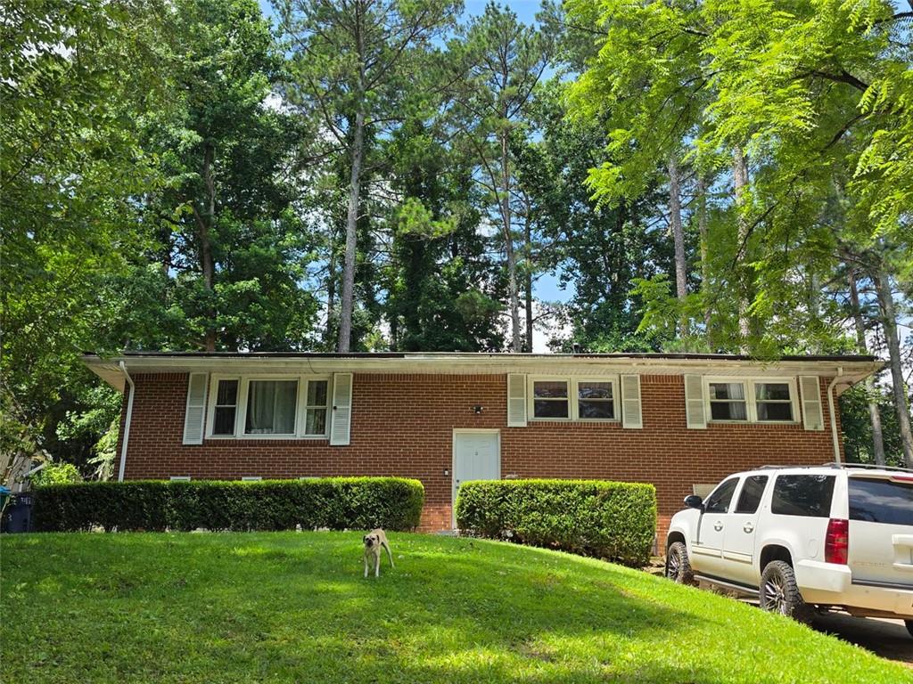 Charming 4-side brick ranch home with basement. Hardwood & tile floor. Conveniently located close to I-85, I-285, & Marta. Great opportunity for investors!