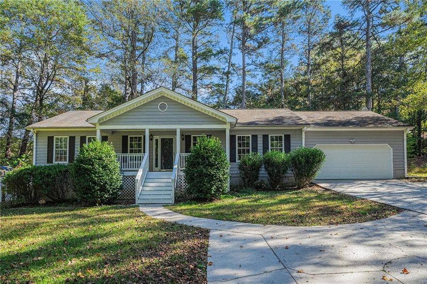 Welcome home to this charming 3-bedroom, 2-bathroom ranch perfectly situated on a peaceful lot in the heart of Auburn.
 This home offers the best of small-town living with the convenience of being minutes from Dacula, Winder, and Braselton,
 plus easy access to Highway 316 and I-85 for an easy commute.
 From the moment you arrive, you’ll fall in love with the inviting rocking chair front porch, overlooking the picturesque
 creek that runs along the front of the property—a truly serene setting. Inside, a vaulted family room welcomes you with
 a cozy fireplace, creating a perfect gathering spot for family and friends.The kitchen features crisp white cabinets, a tiled
 backsplash, and stainless steel appliances, and flows into the dining area—ideal for everyday living or entertaining.
 The primary suite is privately tucked away on one side of the home and offers a tray ceiling, walk-in closet, and ensuite
 bath. Two secondary bedrooms are located on the opposite side, sharing a full bath, perfect for guests or family. The large
 laundry room adds extra convenience and functionality to the layout.
 Step outside to enjoy the newly built deck, perfect for morning coffee, weekend barbecues, or simply taking in the
 tranquility of the private, tree-lined backyard. The 12x16 outbuilding provides flexible space for a workshop, hobby area,
 or additional storage, and the extended driveway offers ample parking for guests, a boat, or an RV.
 Located inside the City of Auburn, this home offers a rare combination of privacy and proximity to amenities. You’re just a
 short drive from local parks, schools, shopping, and dining—while still feeling worlds away in your peaceful country-style
 setting.
 With its charming curb appeal, thoughtful updates, and desirable location, this Auburn ranch is the perfect place to call
 home!
