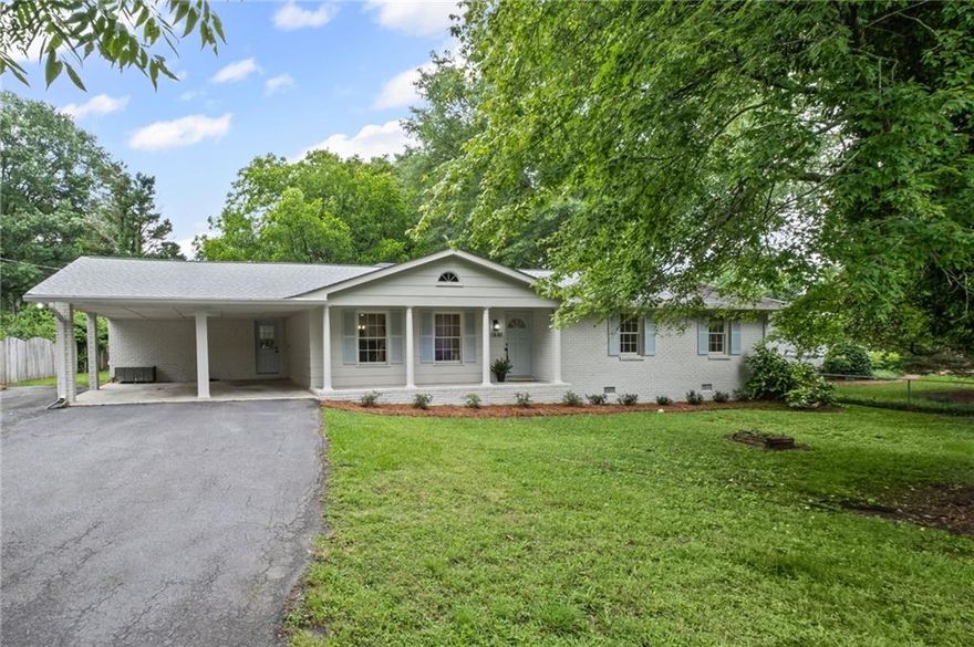 ATTENTION BUYERS ****  $20,000 BUYER BONUS! Bonus can be applied to interest rate buy down, closing costs or adjustment in purchase price.  Seller can do a quick close if needed.  Charming Updated Ranch in Downtown Alpharetta! Welcome to 1830 Mayfield Road a beautifully renovated 3-bedroom, 2-bathroom ranch-style home located less than a mile from the vibrant heart of Canton Street. Nestled in one of Alpharetta's most sought-after communities, this home offers unmatched access to an array of local shops, dining, and entertainment options, all while providing a peaceful retreat to come home to. This delightful 4-sided brick home showcases a modern open-concept floor plan that seamlessly connects the living and family room areas perfect for entertaining or everyday comfort. Step inside to enjoy a fresh designer palette with new interior and exterior paint, luxury vinyl plank flooring, and oversized baseboards that add to the home's contemporary feel. Stylish touches throughout include a board and batten feature wall in the family room and shiplap accents in the guest bathroom. The kitchen and bathrooms shine with quartz countertops, new tile, and a completely updated primary bathroom featuring a spacious walk-in shower and modern vanity. Enjoy cooking and gathering in the kitchen with all-new stainless-steel appliances, including a range, dishwasher, and microwave. Additional upgrades include new lighting fixtures, recessed can lighting, and a ceiling fan for year-round comfort. Step outside to relax in the inviting 3-season porch or enjoy the expansive, flat backyard perfect for entertaining, gardening, or play. The outdoor space has been thoughtfully enhanced with new landscaping, including the addition of azalea and gardenia bushes that bring seasonal color and fragrance to the yard. Pre-built planters and two storage sheds add both beauty and functionality to this impressive outdoor retreat. With its thoughtful updates, timeless charm, and prime location in Downtown Alpharetta, this home is truly move-in ready. Don't miss the opportunity to own this beautifully updated gem in a community known for its exceptional quality of life!