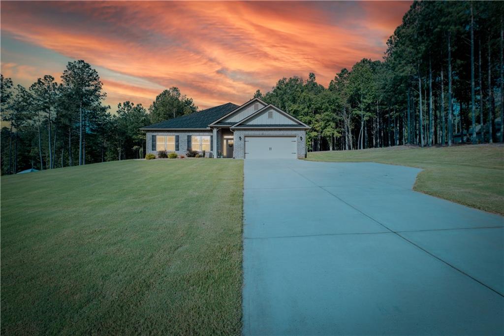 Stunning 2023 Ranch Home in Maysville - A Must-See! Welcome to this immaculate, move-in ready 4-bedroom, 3-bathroom ranch-style home in the desirable community in Maysville. Seller is offering $3000 seller incentive buyer can use to their discretion plus lender credit of $4500 offered when Preferred Lender is used. Situated on a beautifully maintained lot, this home is designed with modern living in mind, offering a spacious open floor plan, massive rooms, and luxurious upgrades throughout. As you step inside, you'll be greeted by a light-filled, expansive family room that flows seamlessly into the eat-in kitchen, creating the perfect space for both relaxing and entertaining. The open dining area is ideal for hosting family dinners or gatherings with friends. The eat in chef's kitchen features modern appliances, and ample counter space, perfect for meal prep or casual dining. The home features a unique in-law or roommate floor-plan, with two primary bedrooms-one on each side of the home-ensuring privacy and comfort for all members of the household. The main primary suite is an absolute retreat, boasting generous space, a walk-in closet, and a luxurious en-suite bathroom. Additional highlights include: Upgrades throughout, including a hot water recirculating system for on-demand hot water. Electric blinds installed throughout the home, offering both convenience and a sleek, modern look. A 12x20 Derksen storage building with electricity-perfect for storage, hobbies, or a workshop. A full irrigation system covering all four sides of the property, ensuring lush landscaping year-round. Insulation added to the attic over the garage for enhanced energy efficiency and comfort. Covered back porch with a TV hookup, ideal for enjoying evenings outdoors or watching your favorite shows while relaxing. Conveniently located, this home is just a short drive to shopping, restaurants, and the Tanger Outlet Mall (only 10 minutes away!), providing easy access to all your shopping and dining needs. Whether you're looking for extra space for your family or a home that can comfortably host guests, this property checks all the boxes. Don't miss the chance to make this beautifully upgraded home yours! Schedule your private showing today!