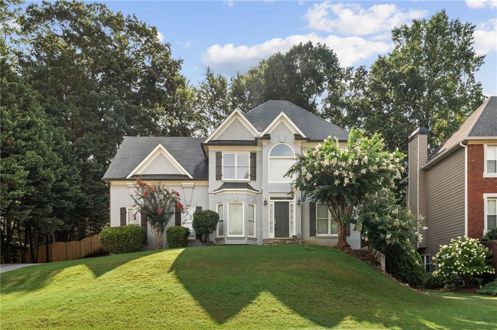 Welcome home to the prestigious Highland Park community and a house that is just waiting on you to make it your own! As you enter, you'll be wowed by the open layout that still allows each space to serve its own function: A large flex room/office to the right, a formal dining area to the left, and straight ahead- the living room which boasts gorgeous natural-light and a perfect view of the back yard and deck. And once you've caught a glimpse of the kitchen, you'll be delighted to discover the upgrades already there: granite countertops, sturdy wood cabinetry, a working island... and a fabulous view of the fireside family room! There is also a powder bathroom on the main level, making entertaining and every-day-living easy to do! Imagine using paint color to define, highlight and bring together all of these areas! Once you go upstairs, you'll notice the newer bathrooms with Carrara tile patterns and updated vanities! The primary bathroom is a wow-factor all on its own: separate sink vanities, a soaking tub and walk-in shower... all with an abundance of natural light to make it truly feel serene. To make things even better- the laundry room is situated upstairs in a convenient location between all bedrooms... there's newer AC... and a full basement ready to be finished! We've brought in a design team to pre-select options for carpets, paint colors, hardware upgrades, etc. and create a customized 'design center' for you to work from while you tour. Plus- we are offering a free 2-hour 'New Home Design Consultation' for the homeowners, valued at $250! This home's location, square footage and layout make it a fantastic opportunity and that's why we are so proud to offer it to you! Enjoy the viewing!