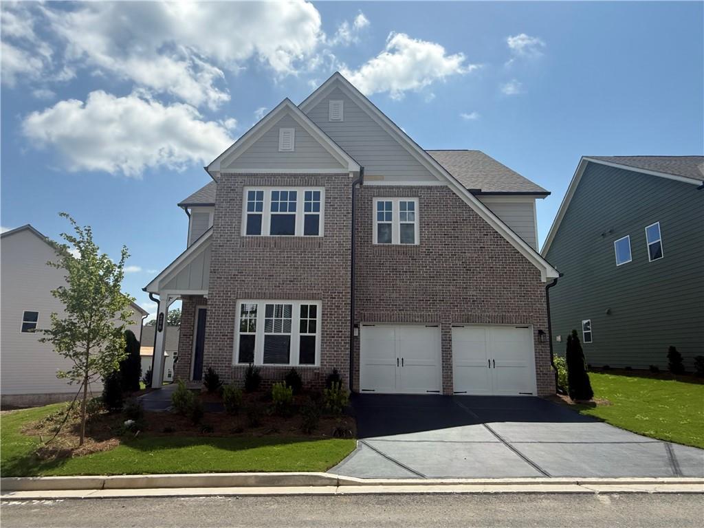 Welcome to your dream home in the established Chestatee community, where natural beauty meets lakeside golf course living. This Leyland plan at East Harbor II offers a stately brick exterior, 5 bedrooms and 4 bathrooms, combining space, style, and functionality. A main-level guest retreat with a full bath welcomes visitors, while the gourmet kitchen, complete with a butler’s pantry, flows seamlessly into the living and dining areas for effortless entertaining. Upstairs, the luxurious primary suite features a spa-like bath and a walk-in closet with direct laundry access. Each additional bedroom offers a walk-in closet with natural light, ensuring ample storage. With a 2-car garage, adjacent mudroom, and elegant design throughout, this home is perfect for comfortable living and unforgettable gatherings.
Located in Dawsonville, GA, East Harbor 2 at Chestatee offers a slice of luxury within a master-planned community. Highlighted by an award-winning 18-hole golf course designed by Denis Griffiths, Jr., residents enjoy first-class amenities including a clubhouse with dining, a private marina, and a Jr. Olympic pool. The active lifestyle is further supported by tennis and pickleball courts, bocce ball facilities, and a comprehensive trail system for outdoor enthusiasts. The lakeside pavilion and community square foster a strong sense of community through regular social gatherings and events. Additionally, the proximity to North GA Premium Outlets and the University of North Georgia offers convenience and leisure opportunities. East Harbor 2 seamlessly blends luxury living with the charm and tranquility of Dawsonville, making it an ideal community for those seeking quality, convenience, and a vibrant lifestyle.
This home has a projected delivery date of July/August 2025. For further details and information on current promotions, please contact an onsite Community Sales Manager.
Please note that renderings are for illustrative purposes, and photos may represent sample products of homes under construction. Actual exterior and interior selections may vary by homesite.