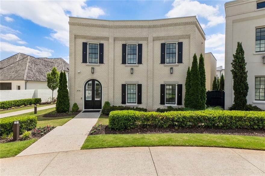 COURTYARD CALM, DOWNTOWN ENERGY
 
With designer touches like wide-plank white oak floors, an unbeatable location, a chef’s kitchen outfitted with Sub-Zero and Wolf and resort-style amenities throughout, this Avalon Grand Villa defines effortless elegance.
 
Conveniently located in the heart of Alpharetta near the Alpha Loop—with a quick hop to GA-400—this gem offers access to world-class dining, live music and boutique shopping—without sacrificing privacy or peace. Start the day with a run on the Loop, pop into Whole Foods for fresh flowers and wrap up the morning with coffee in a private courtyard oasis. It’s resort-style living with a downtown vibe. No valet ticket needed, but bring the cars anyway—this home comes with a three-car garage and plenty of space.
 
Inside, the main level commences with a bright, open-concept layout designed for effortless entertaining, enhanced by 11-foot ceilings, Mohawk-engineered white oak floors and abundant natural light. Overlooking a cozy dining area and a fireside living room, the chef’s kitchen stuns with Sub-Zero and Wolf appliances, an oversized island for casual gatherings, sleek cabinetry and quartz countertops. A private main-level bedroom provides a quiet retreat for guests or work-from-home needs. The attached three-car garage boasts granite floors and soaring 12-foot ceilings that offer room to spare—whether for cars, bikes, paddleboards or a fully equipped workbench and a Level 2 EV charger. Backed by a suite of behind-the-scenes upgrades—like a whole-house water filtration system, dual tankless water heaters and a brand-new HVAC—this home is as high-performing as it is beautiful.
 
Upstairs, the sunlit owner’s suite feels like a private retreat, complete with his and hers closets, dual vanities, a soaking tub and a walk-in shower designed for daily unwinding. Two spacious secondary bedrooms offer room to grow, rest or work—each a calm, curated space of its own. Behind the elevated finishes lies a floor plan built for real life—complete with a cozy bonus room with built-in bookshelves that invites quiet mornings, afternoon reads or an inspiring creative corner, a spacious laundry room ideal for sorting and folding and a built-in doggy room that adds both character and convenience. Welcome to a space that serves, surprises and delights. Welcome to 316 S. Esplanade.