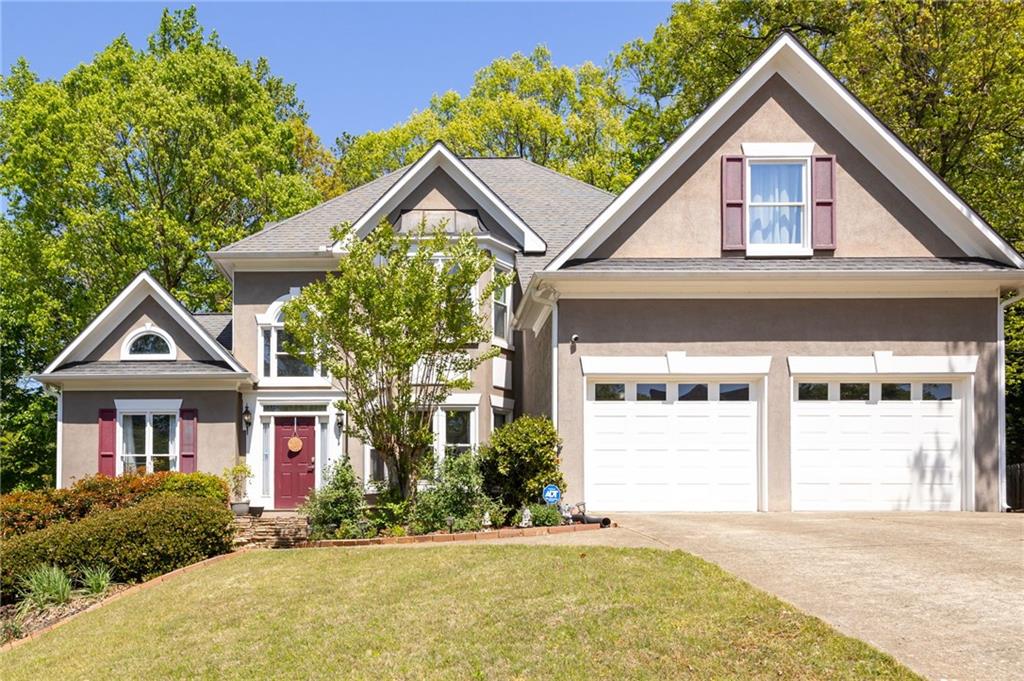 Welcome to this beautifully maintained 4-bedroom, 3.5-bath home nestled in the highly sought-after Sandy Plains community. Offering just over 3,600 square feet of sophisticated living space, this home seamlessly combines timeless charm with modern upgrades in an unbeatable location.
From the moment you enter, you’ll be greeted by an abundance of natural sunlight and thoughtful design throughout. The inviting front sitting room provides a perfect space for a home office or cozy den and is conveniently located across from the elegant formal dining room—ideal for hosting gatherings.
The heart of the home is the expansive great room with a fireplace, open to the stunning gourmet kitchen featuring granite countertops, newer cabinetry, stainless steel appliances, an eat-in island, and a charming keeping room with its own gas log fireplace—creating a warm and welcoming space for everyday living. Upstairs you’ll find all four spacious bedrooms, a well-appointed laundry room, and a recently renovated owner’s suite that serves as a true retreat. The primary bathroom boasts tray ceilings, dual vanities with quartz countertops, a beautifully tiled walk-in shower, a soaking tub, and a generous walk-in closet with custom built-ins. The secondary Jack and Jill bathroom has also been updated with stylish new vanities, sleek quartz countertops, and modern fixtures—offering both functionality and flair. The powder room on the main level has been similarly upgraded, creating a cohesive, polished feel throughout the home. The fully finished daylight basement offers incredible flexibility with a large rec room, bonus room, a potential guest suite, full bathroom, and a dedicated workshop/storage area—perfect for multi-generational living, hobbies, or home gym. Step outside to a landscaped backyard complete with a deck for entertaining and a cozy fire pit area—an ideal setting for relaxing evenings under the stars. Located in a vibrant HOA community, residents enjoy access to a large Olympic-sized pool, tennis courts, playground, and a beautiful clubhouse perfect for special events and celebrations. With shopping, dining, and entertainment just minutes away—and quick access to I-75 and I-575—this home offers the perfect balance of convenience and comfort, just a short drive to both Woodstock and Roswell.
Don’t miss the opportunity to own this exquisite home in one of East Cobb’s most desirable neighborhoods!