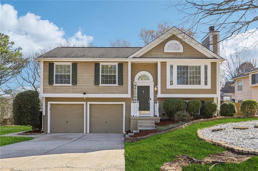 Nestled in a vibrant and welcoming Alpharetta neighborhood, this beautifully updated bi-level home offers 3 bedrooms, 2.5 bathrooms, and a versatile bonus room, blending style, comfort, and smart living. Step inside to a bright, open layout where the living and dining areas flow seamlessly, leading into a fully renovated kitchen with quartz countertops, hardwood cabinetry, soft-close drawers, tile flooring, a stylish backsplash, and enhanced lighting. Elegant custom solid wood doors, new energy-efficient windows with custom blinds, and hardwood floors throughout add warmth and sophistication, while smart features like a Nest thermostat, OneLink Smart Home devices include smoke detectors with Alexa, smart light switches, a Ring security system, and smart locks on both the front door and garage offer convenience and peace of mind. The lower level includes a bonus room with a fireplace, a half bath, laundry room, and access to a two-car garage with smart opener and keyless entry. Enjoy outdoor living on your deck in the beautifully landscaped backyard with motion-sensor lighting, a storage shed, and a remote-controlled sprinkler system. Upgrades continue with newly painted walls, siding, garage doors, gutters, and deck, water-efficient toilets, modernized bathrooms with updated tile and spa-like showerheads, and a new main electrical panel plus termite protection plan. Located in a community with a park, playground, basketball court and green space, and just minutes from GA-400, Big Creek Greenway, Chattahoochee River, Wills Park, Avalon, and North Point Mall, this home offers thoughtful upgrades, unbeatable location, and everyday comfort—truly a rare find at this price.