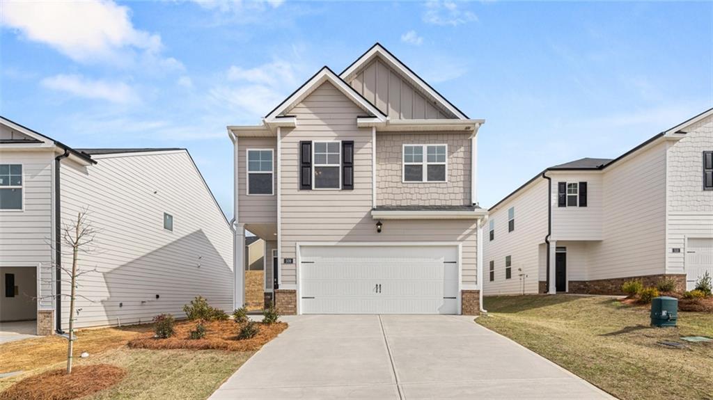New Construction in Newnan, GA | 4 Bed, 2.5 Bath Smart Home in Poplar Preserve Experience comfort, style, and convenience in the Somerset floor plan-a thoughtfully designed two-story, 4-bedroom, 2.5-bath home located in the highly sought-after Poplar Preserve community in Newnan, Georgia. Built for the way you live, the main level features an open-concept layout that seamlessly connects the family room, dining area, and kitchen-perfect for entertaining or relaxing at home. The updated kitchen design includes updated countertops, and tile backsplash, stainless steel appliances, a walk-in pantry, and a central island for casual seating and extra prep space. Upstairs, the spacious owner's suite offers a retreat-like feel with a large walk-in closet and a spa-inspired bath complete with dual vanities and an oversized tiled shower. Three additional bedrooms and a full bath are tucked away for privacy, while the second-floor laundry room adds everyday convenience. Additional highlights: * Upgraded kitchen finishes with updated counters and tile backsplash * Smart Home technology package with keyless entry and voice-activated controls * Craftsman-style brick-accented exterior on a level homesite * Attached 2-car garage with kitchen-level entry * Zoned for East Coweta Schools * Energy-efficient construction * Convenient access to I-85, Ashley Park, and Piedmont Newnan Medical Center Whether you're a first-time buyer or a growing household looking for a low-maintenance new home, the Somerset offers elevated finishes, a thoughtful layout, and timeless curb appeal-all just 30 minutes from downtown Atlanta. Photos are for illustrative purposes only and may not reflect the exact home details. Contact us today to schedule your private tour.