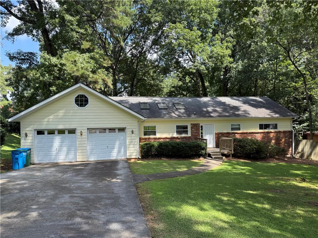 This is the one you've been waiting for! Come check out this amazing house in an amazing location. Northwoods community is centrally located with parks and green spaces throughout. This ranch home is located on a large flat lot with lots of outdoor space to enjoy. The interior has hardwood floors throughout and vaulted ceilings with wood beams. Tons of natural light throughout. Washer / dryer included. Yard maintenance included in the rent. Flat driveway and two car garage. The home has it all!