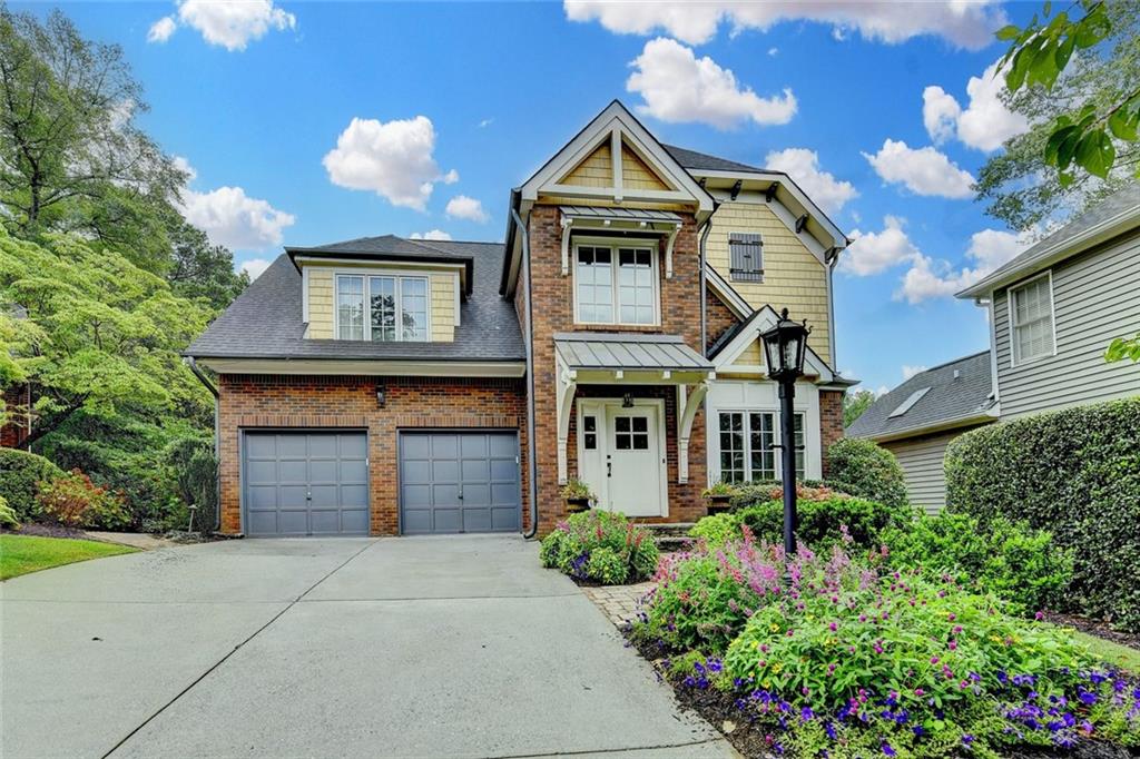 Fall in Love with Storybook Charm at 2611 Briers North Drive. Begin your next chapter in this enchanting Victorian-inspired neighborhood, nestled on a peaceful cul-de-sac that’s perfect for kids and community living. This lovingly maintained 3-story home is filled with warmth, character, and timeless style — truly one of a kind. With 4 spacious bedrooms, 3 full baths, and 2 half baths, there’s room to grow, entertain, and thrive. Multiple flexible living spaces include a separate office and a top-level game room, ideal for movie nights, workouts, or teen hangouts. Hardwoods flow throughout, creating cozy nooks for family, friends, and pets to gather. Two fireplaces —one just off the kitchen — set the tone for memorable moments, while a screened-in porch and two large outdoor living spaces welcomes year-round entertaining. The formal dining room and open layout make hosting effortless. The beautifully updated primary suite features custom closets and a spa-like bathroom with dual vanities, soaking tub, and separate shower — your perfect retreat at day’s end. What sets this home apart? Step through the backyard gate and into your own secret sanctuary. Professionally designed to resemble a traditional English-style secret garden, this lush escape includes stone pathways, water features, tranquil sitting areas, and vibrant blooms. Privately owned and currently shared with just six neighbors, it’s a magical setting like no other. This highly coveted neighborhood is a true gem: diverse, welcoming, and filled with young families, community events, and supportive neighbors. The sense of belonging here is real. Located minutes from top-rated schools, Dunwoody’s best parks, shopping, and dining, this is where convenience meets connection — and where every chapter of life can beautifully unfold. Schedule your tour today and experience the magic of 2611 Briers North Drive