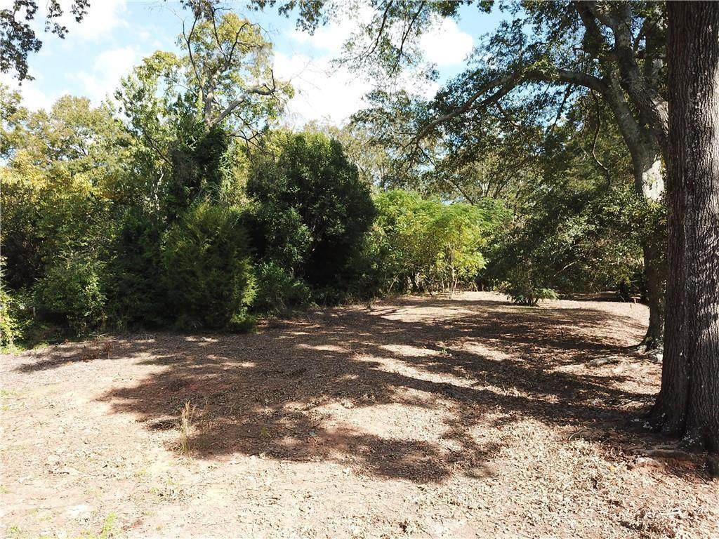 Don’t miss your chance to own a premium, level corner lot in one of Griffin’s most desirable areas. This spacious and mostly cleared property offers a blank canvas for a homeowner or savvy investor ready to bring their vision to life. Ideally situated, the lot provides convenient access to local dining, shopping, entertainment, and just minutes from I-75—offering the perfect blend of suburban charm and modern convenience. Whether you're planning to build a custom home, place a mobile home, or develop an investment property, this lot offers endless possibilities. With its prime location and strong growth in the area, the potential here is exceptional. Take advantage of this rare opportunity to be part of Griffin’s expanding community!