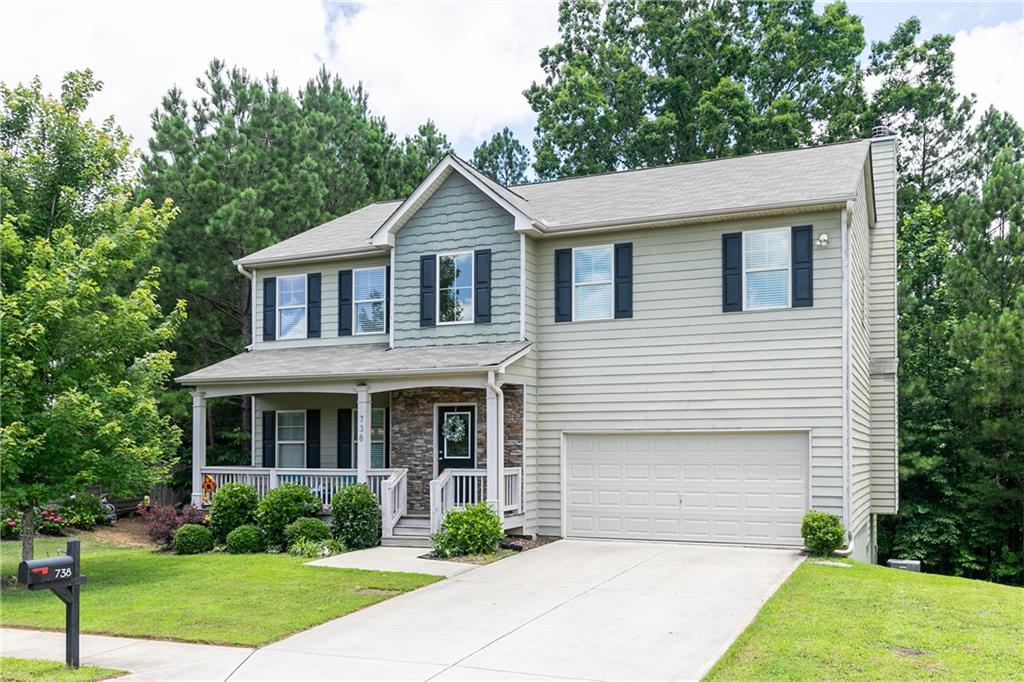 Welcome home to this beautifully designed residence that perfectly balances charm, function, and comfort. Just 6 years new, this home offers the peace of mind that comes with newer construction—all the important systems are ready to go! From the moment you step onto the welcoming covered front porch, you’ll feel right at home. Inside, the open floor plan creates an easy and natural flow between living spaces, with a fireplace-adorned family room that invites you to relax and unwind. The heart of the home, the kitchen, boasts an abundance of counter space, lovely white cabinets, granite countertops, an island, and a well-coordinated backsplash that ties everything together. Just off the sunny breakfast nook, step out onto the deck overlooking your private backyard—plenty of room for a garden, play area, or simply enjoying nature. Upstairs, you’ll find four generously sized bedrooms, including a spacious primary suite with vaulted ceilings, a large walk in closet plus an ensuite featuring a double vanity, separate water closet, and a large soaking tub that’s perfect for end-of-day relaxation. A full hall bath with a double vanity serves the secondary bedrooms with ease and style. You’ll also appreciate the convenient upstairs laundry room, making laundry day a whole lot easier! And don’t miss the expansive unfinished basement—ideal for storage now, and full of potential for future living space. Whether you finish it one room at a time or all at once, the possibilities are endless. And here’s the cherry on top: NO HOA, a great location close to schools, shopping, parks, and more… all at a fantastic price. Great layout. Private yard. Full basement. What's not to love?