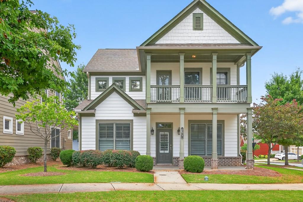 This gorgeous, move-in ready home with a master on the main is nestled just minutes from Suwanee Town Center! Step inside to a bright and inviting living space filled with natural light and upgraded plantation shutters. The kitchen features sleek granite countertops, stainless steel appliances, and plenty of cabinet and counter space for all your culinary needs. Upstairs, you'll find 3 spacious bedrooms, abundant storage, and your very own private balcony, the perfect spot to unwind and enjoy the outdoors. Master on the main lever features a spa-like master bath includes a zero-entry glass shower and walk in closets. Enjoy a low-maintenance lifestyle with an HOA that includes lawn care and pine straw, plus access to a community pool, playground, and dog park. With direct access to the Suwanee Greenway, you can easily explore nearby walking and biking trails, or stroll to Suwanee Town Center's shops and restaurants. Don't miss your chance to live in the heart of Suwanee!
