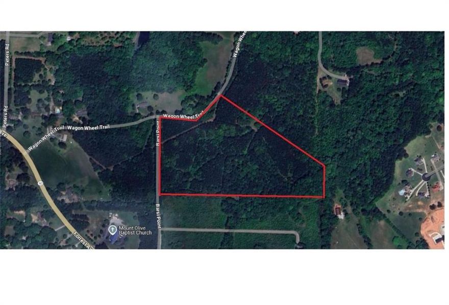 Beautiful 24.45-Acre Wooded Lot in Fayetteville, GA - Available as a Whole or in three 8.15-Acre Tracts.      Nestled in the heart of Fayette County, this expansive 24.45-acre parcel offers a rare opportunity to own a private slice of Georgia's natural beauty. The land is richly wooded with a mix of mature hardwoods and towering pines, creating a peaceful, scenic backdrop that's perfect for a homesite, retreat, or investment.    The property features gently rolling terrain, multiple potential building sites, and an abundance of wildlife-making it ideal for those seeking privacy, natural beauty, and flexibility. Whether you're envisioning a secluded estate, a recreational getaway, or future development, this property checks all the boxes.    For added flexibility, the land is available as a whole 24.45-acre tract or subdivided into three equal 8.15-acre tracts. Each tract offers ample space and privacy, with direct access and utilities nearby.    Located just minutes from downtown Fayetteville, Trilith Studios, and highly rated schools, you'll enjoy a peaceful rural feel without sacrificing convenience.