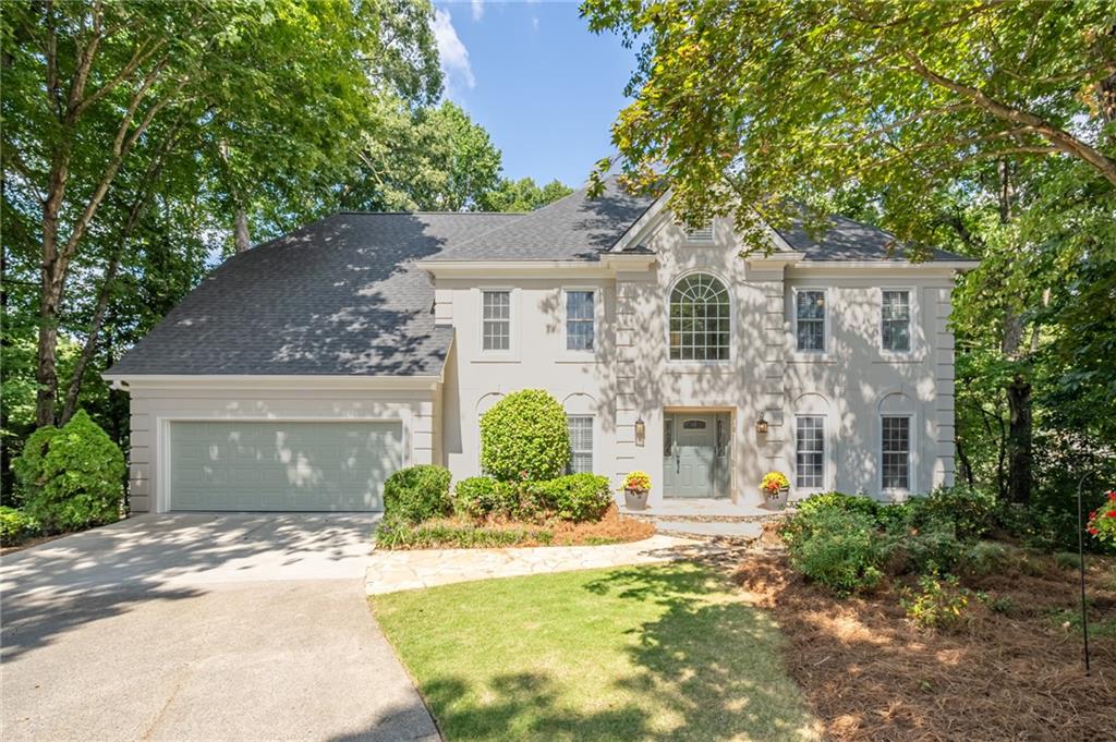 Discover your dream lifestyle in coveted Camden Place! This exceptional home is set on a private cul-de-sac in one of East Cobb’s most desirable executive neighborhoods with award-winning schools and resort-style amenities of pool, tennis, and clubhouse. The showstopper is a dramatic sunroom—a unique space that flows seamlessly from the gourmet kitchen and soaring 2-story family room with 20-foot ceilings. The kitchen features granite counters, Wolf gas cooktop with 22,000 BTU wok burner and professional vented hood, built-in wine fridge, and breakfast area. A main level bedroom with custom built-ins doubles as an ideal work-from-home office with direct deck access for fresh air breaks. Upstairs, the owner’s suite offers a sitting room, two large walk-in closets, a renovated spa bath with dual vanities, oversized shower, and soaking tub. The secondary bedrooms share a spacious Jack-and-Jill bath. The terrace level boasts a private movie theater, kitchenette, and workshop, full bath, plus a terrace-level bedroom with direct access to a covered, secluded hot tub deck that feels like a private spa. Outdoor living continues with multiple decks for great entertaining areas, covered patio, and a landscaped, fenced yard. NEW roof! Everyday conveniences include a large laundry room and extra fridge off the garage entry. Minutes to East Cobb and Historic Roswell dining, shopping, and the Chattahoochee River’s parks and trails