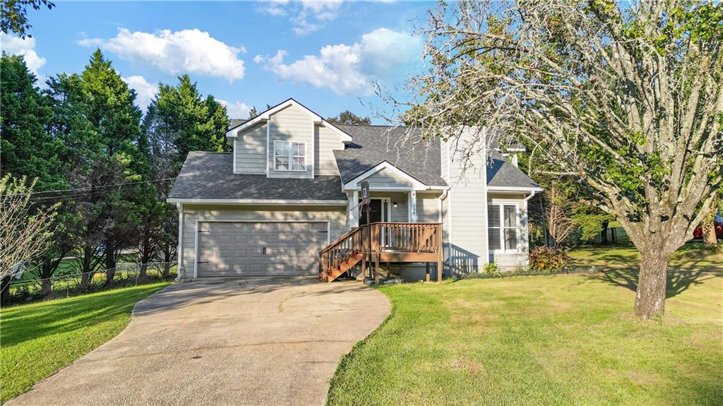 Welcome to this charming 3BR/2.5BA craftsman style home nestled on a spacious 0.74 acre corner lot in the quiet Huckleberry Hills community. This well-maintained residence features an open-concept floor plan with high ceilings, a cozy fireplace in the family room, and a kitchen that overlooks the breakfast area and living space perfect for everyday living and entertaining. Enjoy outdoor living on the oversized rear deck overlooking a large, fenced backyard. Primary suite on main level with two additional bedrooms upstairs. Fresh paint, modern laminate flooring, and updated systems. Conveniently located near schools, shopping, and Hwy 316. Don't miss this move-in ready gem in Auburn!