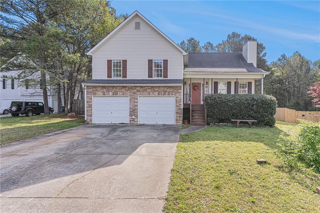 Welcome to your dream home in the serene and tranquil town of Kingston, Georgia. This charming split-level home is located on a cul-de-sac, offering you privacy and quiet surroundings. As you approach the property, you'll be greeted by a cozy front porch, perfect for enjoying your morning coffee or relaxing in the evenings. The living room features a beautiful shiplap wall and a cozy fireplace, creating a warm and inviting atmosphere. The kitchen has been tastefully updated and remodeled with stunning white cabinets, giving it a modern and sophisticated look. One of the unique features of this home is the lower level space and finished basement, providing you with endless options for use. Whether you want to create a home gym, an entertainment room, or a guest suite, the possibilities are endless. Step outside to the backyard oasis, where you'll find a large, fenced-in yard with a playhouse, providing the perfect space to play and explore. Additionally, there's a rear deck, perfect for hosting barbeques or relaxing in the warm Georgia sunshine. Overall, this home has been lovingly updated and meticulously maintained, and it's ready for you to move in and make it your own. Don't miss this opportunity to own your dream home in Kingston, Georgia!