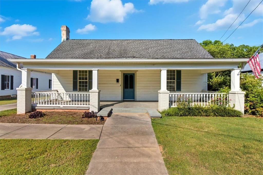 Built in 1920, this beautifully remodeled historic home offers the perfect blend of timeless character and modern convenience. Nestled on a quiet street in downtown Adairsville, every detail has been thoughtfully updated while preserving the original charm.
Inside, you’ll find soaring ceilings with elegant molding, three stunning fireplaces, and even the oldest clawfoot tub in Adairsville, dating back to 1920. Modern upgrades include a tankless water heater, updated plumbing and electrical, spacious walk-in closets, a roof replaced within the last 10 years, HVAC just 4 years old and new LVP throughout the home.
The detached shed features a workshop plus a finished, soundproof room — perfect for a home office, studio, or creative space.
Enjoy the charm of a one-lane historic street while being just steps away from the conveniences of downtown Adairsville. This is more than a house — it’s a piece of history ready to welcome its next chapter.