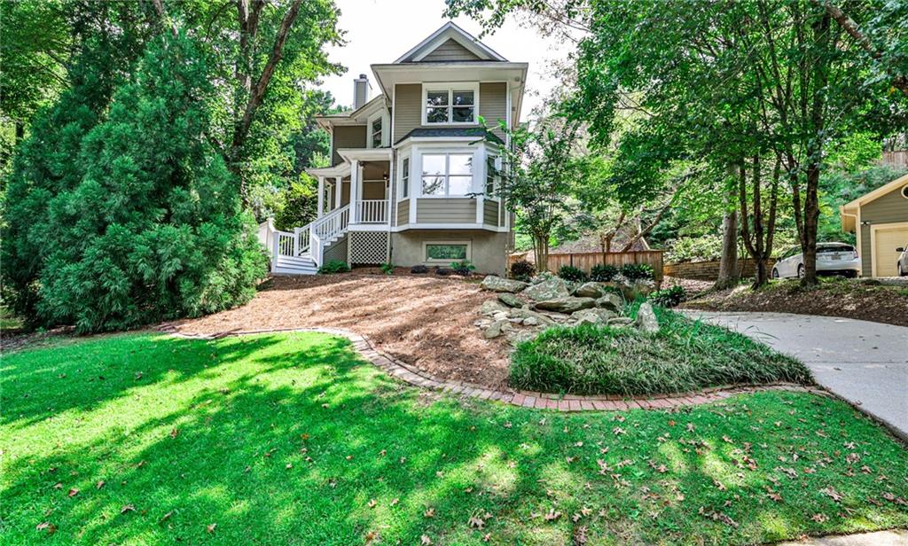*OPEN THIS SUNDAY, 9/7 from 2-4PM! A very charming 4 bedroom, 3.5 bathroom Lake Claire gem, perfectly perched on a peaceful cul-de-sac! Elevated for privacy and curb appeal, the home greets you with a fabulous front porch—ideal for morning coffee or evenings spent unwinding. Step out back and you’ll find not one, but two expansive decks, both recently replaced and ready for entertaining, grilling, or simply soaking up the treetop views. It has a 2-car garage with ample storage, a basement with a full bathroom & the location is truly unbeatable—just a short stroll to the Lake Claire community pool and minutes from Little Five Points, Candler Park Golf Course, Deep Dene Park, and all the best Intown dining, shopping, and culture. Here, you get the rare balance of quiet neighborhood living with easy access to everything Atlanta has to offer!