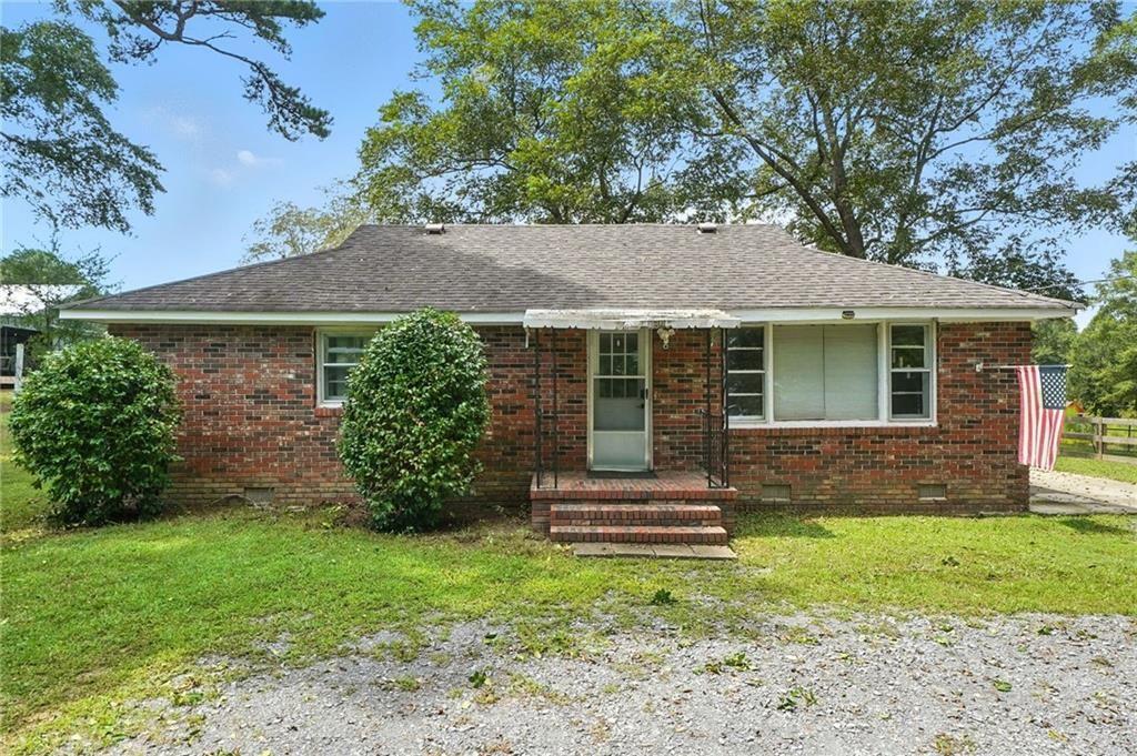 Charming all-brick ranch featuring three bedrooms and a beautifully renovated bath! The updated kitchen boasts solid surface counters, tile backsplash, refrigerator, and a spacious breakfast area. A versatile bonus room with washer and dryer opens to the spacious backyard, full of possibilities. Recent upgrades include new LVP flooring, HVAC (2023), and water heater (2024). The 3 ACRE property also includes three storage buildings—including a goat barn and a fabulous chicken coop! Enjoy close proximity to downtown Cedartown and the Silver Comet Trailhead, only a short drive away.