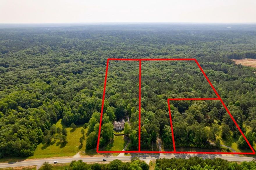 Wonderful Assemblage of 50 +/- Acres in prime location, only blocks from Trilith Studios. Imagine the possibilities of what can be done with this land. Land is being sold simultaneously with 539 Veteran Parkway and 557 Veterans Parkway. Currently zoned residential. This exceptional land is located in close proximity to a bustling commercial district. Within a short walk, you will find an array of shops, theatres, restaurants, hotels, and amenities that cater to the needs of residents and visitors alike. The presence of these commercial establishments adds convenience and accessibility to the area, making it an ideal location for various purposes. The excitement of all of the movies and TV shows being made within walking distance.