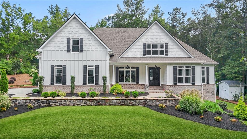 Welcome to this luxurious single-family home at 4720 Bold Springs Rd, Monroe, GA. This stunning home, built in 2021 with architectural excellence, boasts a generous area of 5,557 square feet and sits comfortably on a 3-acre lot. The property enjoys a grand total of six spacious bedrooms, five modern bathrooms, and recent upgrades, including tastefully remodeled bathrooms that enhance the luxurious lifestyle.
As you step into this home, you are greeted by hardwood floors and stylish lighting that illuminate the neutral colors of the open floor plan. The inviting living spaces bask in an abundance of natural light and benefit from featured fireplaces for a warm, cozy ambiance.
The kitchen is sure to inspire your culinary creativity with high-quality counters, premium appliances, and an attractive layout flooded with natural light. Accommodations include a primary bedroom enhanced by walk-in closets and a magnificently large yard, attractively landscaped to offer beautiful outdoor living spaces.
Also featured are outdoor structures such as a patio, a shed, and a deck that cater to a variety of outdoor activities. A basement and multi-car garage provide ample storage, and the home benefits from its proximity to local amenities and advantages of the local real estate market. Don't miss this opportunity for a timeless investment.