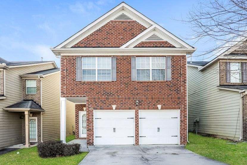 Live large in this 5-bedroom brick-front home with the master on the main! You will love the living area that opens to the kitchen. Upgrades include extra trim, vaulted ceilings and laminate flooring. A spa-like master bath includes a dual vanity and separate tub/shower. Create an office or hobby space in the loft area. Walk-in closets in every room. A back patio offers a perfect opportunity to blend indoor and outdoor living! Come take a look.