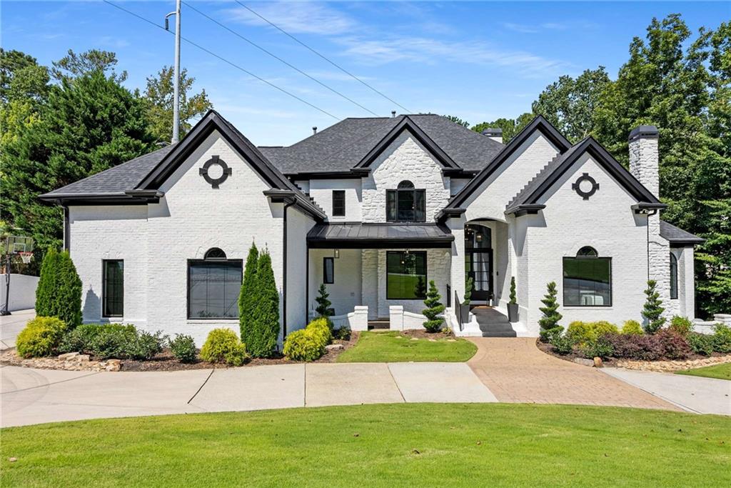 Step into luxury living at 4505 Bastion Dr, perfectly situated in one of the area’s most sought-after neighborhoods, featuring a top-rated school district, community pool, and tennis courts. This exceptional home has been thoughtfully upgraded from top to bottom, blending modern elegance with smart-home convenience to deliver truly move-in-ready living.
Enjoy modern comfort and peace of mind with soundproof windows installed in 2022, a brand-new roof completed in 2023, and upgraded metal exterior doors plus new interior doors added in 2022 for enhanced security and style. Inside, new flooring throughout creates a cohesive, fresh look, while the chef’s kitchen and spacious family room provide the perfect space for entertaining or everyday living. The outdoor areas are just as impressive, featuring a fully enclosed, upgraded patio, a new Trex deck, and an electric retractable screen—ideal for year-round enjoyment. Electric blinds throughout the home add a layer of effortless luxury.
This home is equipped with state-of-the-art smart home technology, including a Sonos surround sound system installed both indoors and outdoors, a Lutron smart lighting system, app-controlled thermostats, and an upgraded, app-controlled irrigation system. Stay secure with Ring security cameras and keyless entry on all exterior doors. Fast, reliable AT&T Fiber internet ensures seamless connectivity for work and streaming.
Additional thoughtful upgrades include heated basement toilets, a new water heater (2024), and a whole-house water filtration system (2024)—adding comfort and functionality to every level of the home.
Located in the highly desirable Lassiter High School district, and zoned for Garrison Mill Elementary and Mabry Middle School, this home combines location, lifestyle, and luxury in one incredible package. Don’t miss your chance to own this beautifully upgraded, turn-key home in a premier East Cobb community.