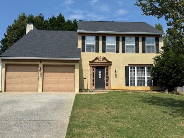 Welcome to 386 Bass Way NW - 4 Bedrooms, 2.5 Bathroom, beautifully updated home located just minutes from Kennesaw State University, endless shopping and dining, and easy access to I-75 & I-575! Property Highlights: Updated kitchen featuring granite countertops, tile backsplash, and stainless-steel appliances, kitchen opens to the family room with a cozy real wood-burning fireplace, spacious, flat fenced backyard - perfect for pets, entertaining, or relaxing outdoors. Roof replaced in 2020. Water heater replaced in 2021 (oversized unit), Gutters replaced May 2025. Nicely renovated with newer systems throughout, Great floor plan for families or as an ideal property for KSU students/investment. This move-in ready gem combines modern updates with a welcoming layout in a fantastic location. Don't miss the opportunity to own in one of Kennesaw's most convenient areas!