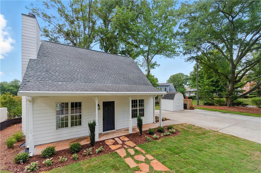 Discover this beautifully renovated two-story home just steps from the vibrant Marietta Square! Located in the heart of the City of Marietta, you’ll enjoy easy access to charming shops, dining, parks, and top-rated schools. This 2-bedroom, 2-bath home combines modern updates with cozy character, featuring a warm fireplace and an open, functional layout perfect for both everyday living and entertaining. Situated on a spacious corner lot, the property offers excellent curb appeal, extra privacy, and plenty of outdoor space. Inside, you’ll find a brand-new kitchen with stainless steel appliances, sleek cabinetry, and updated countertops. Additional upgrades include fresh paint, new flooring, stylish light fixtures, updated doors, and completely renovated bathrooms. Move-in ready and full of charm—this is one you don’t want to miss!