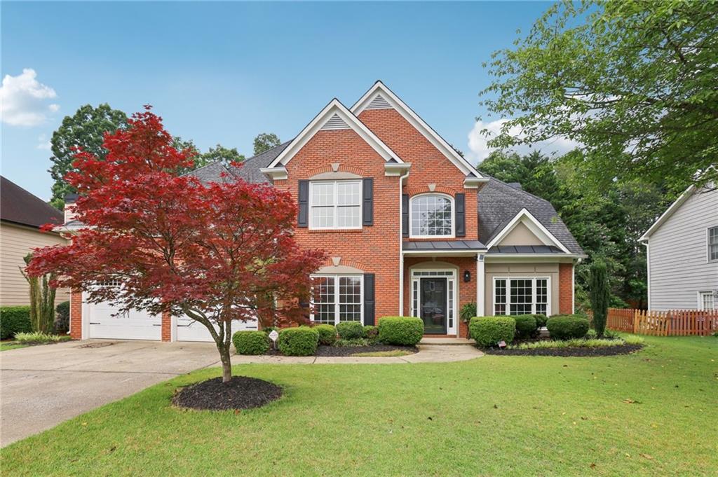 PRICE REDUCED! Welcome Home to the biggest floor plan without a basement in the sought after Community of Camden Pointe. This stunning well maintained 4 bedroom, 3 full bath home is a must-see. Step inside to the 2 story foyer that opens to the dining room and sitting room/home office. Enjoy the open concept with the updated kitchen looking into the living room/family room. Kitchen boast stainless steel appliances, white cabinets, oversized island, and granite countertops. Bedroom on main with a full bath. Hardwoods throughout. Upstairs you will find an oversized master with sitting area, large master bath with separate shower and soaking tub and two master closets. 2 additional bedrooms upstairs that offer ample closet space for all your storage needs. Don't miss the flex room upstairs that would be perfect for a home office. Enjoy the fenced in flat backyard that is perfect for entertaining. Wanting a pool? This private yard would be perfect. Out back you will find additional storage space that has been added to the house for all your gardening needs. This home is sure to impress anyone who walks through the door. In this amenity rich subdivision enjoy swimming, playing tennis, fishing and so much more. Close to shopping, dining and some of the top rated schools in Cobb County. Don’t miss out on this fantastic opportunity to own your dream home!