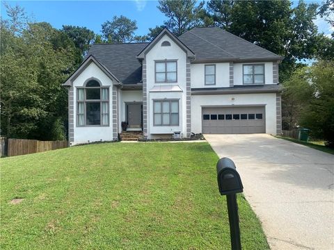 Photo of 2170 Thorndale Drive SW, Lilburn, GA 30047 (MLS # 7638832)