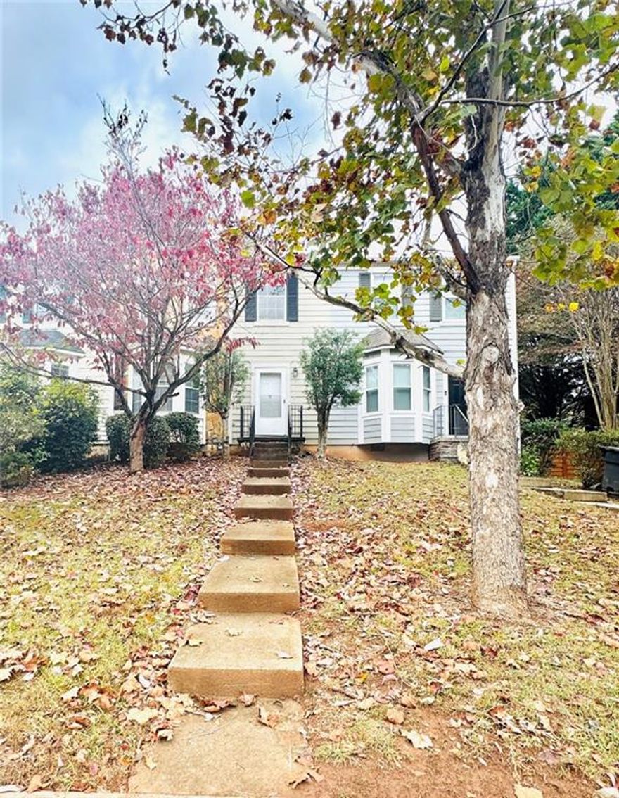 GREAT LOCATION! IN ROSWELL! A Beautiful, charming and renovated Townhome in the heart of the city of Roswell. Ideal for a first homebuyer or investor. This townhome features 2 nicely sized Master bedrooms, each with its own full bath plus a convenient half bath for guests on the main level -  Roomate style -. The home was just recently renovated with New flooring throughout the house and fresh interior painting. No HOA, no rental restrictions.

Large living room flows into the kitchen and dining area with a door leading out to a private deck, perfect for entertaining. The laundry area is located upstairs alongside the bedrooms offering ease and practicality. Two assigned parking spots right behind the unit and low exterior maintanance so you can spend more time enjoying the home rather than maintaining it.

This home is minutes away from major commuter routes including hwy 400. Close to shoppings, restaurants, and nightly entertainmen/events.  Don't miss this opportunity to call this townhome your own Home. Very rare to find a townhome in Roswell at this price. It won't last, so come see it now!