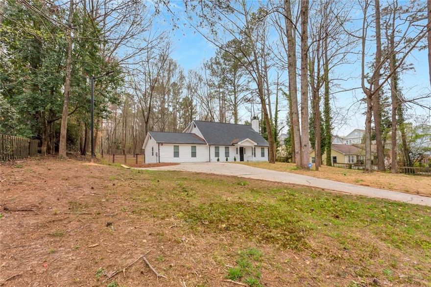 Fully renovated home in desireable North Fulton SChool district--- Cogburn ES, Hopewell MS and Cambridge HS.  No HOA.  Private fenced yard.  Large parking area for vehicles,  Ready to move-in ASAP.  Will consider shorter-term leases for higher rate......  Yard Care included