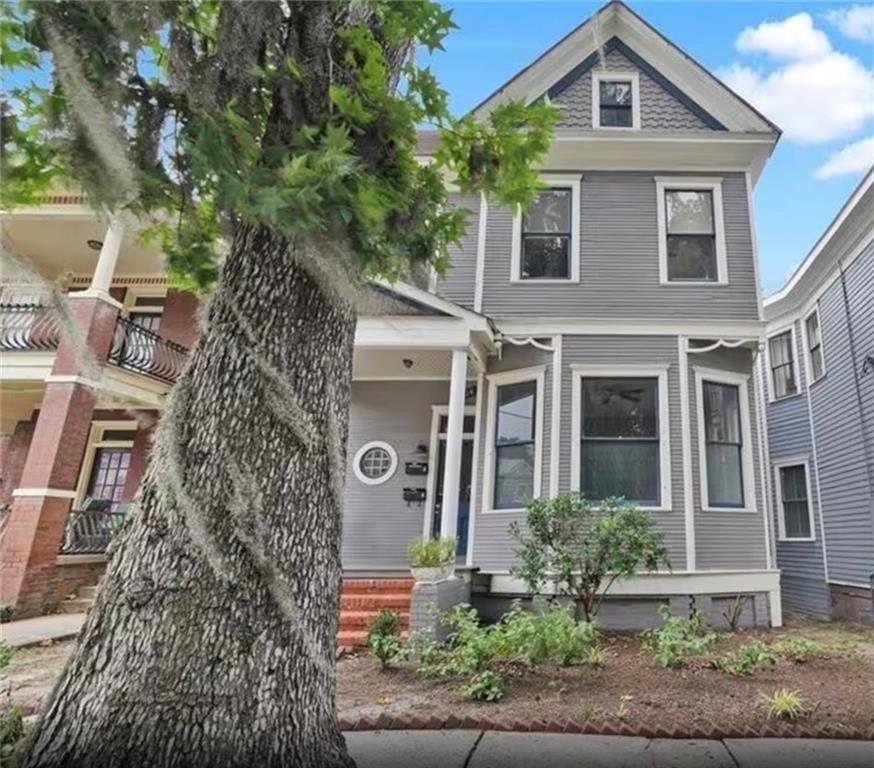 This is an exceptional investment opportunity featuring a spacious two-unit residence. The lower unit offers a charming 2-bedroom, 1-bath layout with two fireplaces, a bay window, and elegant pocket doors. It includes a full kitchen, dining area, and a laundry room equipped with a washer and dryer. The upper unit comprises 3 bedrooms and 1 bathroom, with one bedroom suitable for conversion into a secure office space. It also features a kitchen, dining area, and its own laundry room with washer and dryer. Both units provide generous living space and functional layouts, ideal for multi-family living or rental income.
All this, just minutes away from the distinctive culture and ambiance of historic downtown Savannah.
