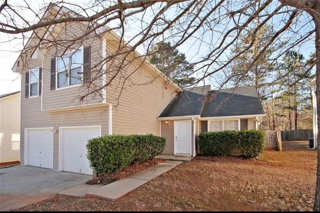 This charming home is designed for comfort and style, featuring three bedrooms and two and half bathrooms, you are welcomed into a comfortable living room that leads around to a separate dining room which sits off the kitchen. The kitchen which also has it's own eating area overlooks the family room. This home is perfect for the first time home buyer or the investor looking to add to their portfolio.