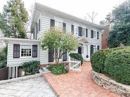 Stunningly renovated Colonial Revival home in the heart of Ansley Park, this 5-bedroom, 4.5-bath residence offers nearly 4,000 square feet of luxurious living space and timeless charm. Originally built in 1920 and fully renovated by Jones Pierce in 2016, the home features a gracious foyer that opens into sun-drenched formal living and dining rooms, both with working gas fireplaces and rich hardwood floors. The gourmet eat-in kitchen is a chef’s dream with stone countertops, high-end appliances, a large center island with wine fridge, and a built-in breakfast banquet. A cozy den or home office with custom built-ins completes the main level.
Upstairs, the elegant primary suite includes a fireplace, a luxurious en-suite bath with soaking tub and large walk-in shower, a custom walk-in closet, and a private screened porch with swing and outdoor TV. Two additional bedrooms share a well-appointed hall bath. The finished terrace level offers a spacious media and game room with built-ins, a wet bar with ice maker and wine fridge, a mudroom, full bath, and a charming bedroom with built-in bunk beds and study space.
A detached two-car garage with dual Tesla chargers includes a beautifully finished carriage house above—perfect for guests, in-laws, or an au pair—with a Murphy bed, kitchenette, and full bath. Outdoor living is just as refined, with a private screened porch and professionally landscaped lot just steps from Piedmont Park, the Atlanta Botanical Garden, the BeltLine, and Midtown’s cultural institutions. This rare Ansley Park gem blends historic character with modern amenities in one of Atlanta’s most coveted neighborhoods.
This home may not be sub-let or offered by tenant on AirBNB VRBO or any other short term rental site