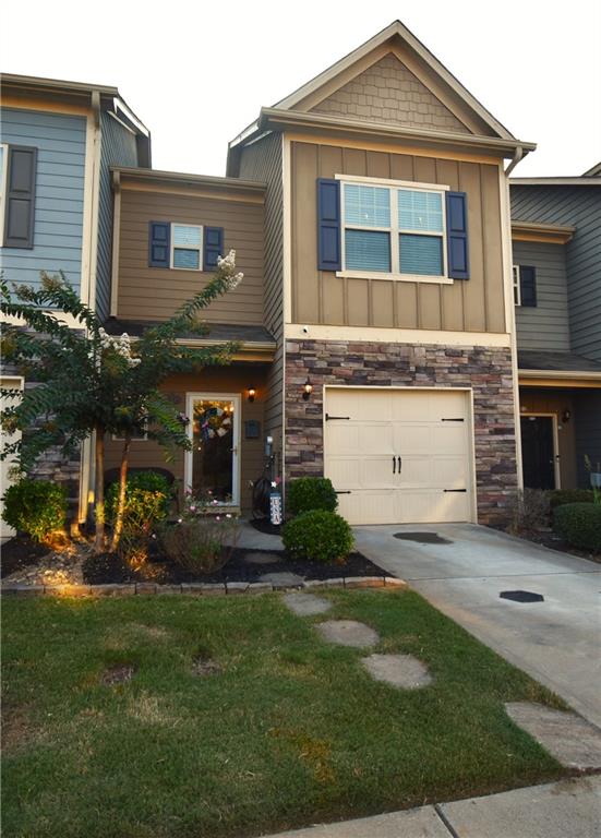 Beautiful 3 Bedroom 2.5 Bath townhome with open floorplan in Hidden Springs. Inviting foyer leads to large Living Room, Dining Room & Kitchen with Breakfast Bar & Pantry. Back Deck is great for grilling and offers privacy for outdoor dining. Upstairs features a Loft with Laundry Closet, a Large Master suite with Tray Ceiling, Double Vanities, Soaking Tub/Shower and Walk-In Closet. The secondary bedrooms are spacious along with the full Hall Bath. Neighborhood offers Swim, Tennis & Playground. Sought after school district Liberty Elementary, Freedom Middle & Cherokee High. Close to Interstate, Shopping, Restaurants & Churches.