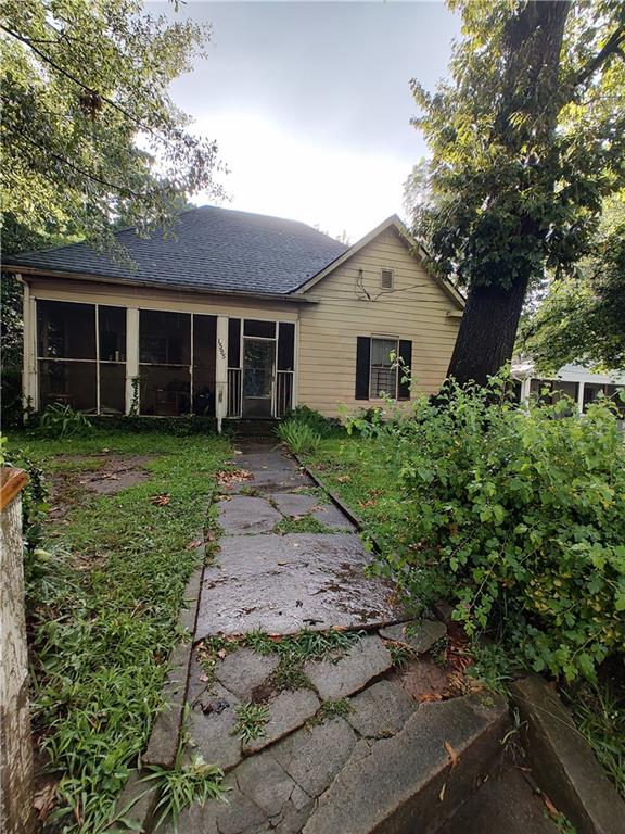 Attention investors and renovators! Rehab Opportunity - 1920s Home with Great Potential This classic 1920-built home is brimming with potential and waiting for your vision. Located in a rapidly developing area, this is the perfect opportunity for a fix-and-flip, long-term rental, or even a full restoration project. The structure needs a full rehab, but the layout and lot provide endless possibilities. Restore its historic charm or modernize it to today's standards.