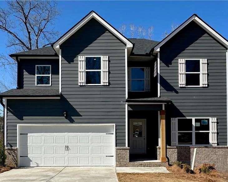 **OVER 3200 TOTAL SQFT. Welcome to your dream home in the desirable Barrington Hall neighborhood! This Gorgeous Redwine Townhouse floor plan seamlessly blends comfort, style, and modern living. The main level features luxurious LVP flooring, providing an upscale, low-maintenance finish. You'll find a spacious living room ideal for gatherings, a cozy family room, and a gourmet kitchen equipped with sleek 36" soft-close cabinets, granite countertops, and recessed lighting throughout the home. Additionally, there is a convenient powder room on this level. Upstairs, the expansive owner's suite includes a plush master bath with dual vanities, a standing shower, and a generously sized walk-in closet. The roomy secondary bedrooms offer flexibility and ample space to meet your needs. This home is an entertainer's dream, situated in a peaceful neighborhood yet close to major highways for easy access to city conveniences. Whether you enjoy hosting friends or spending quality time with family, this home and community are designed for you. Don't miss out! This home is 100% financing available. We are offering great buyer incentives with the use of an approved lender. Schedule your showing today and make this stunning property your new home! Home is under construction.. Photos are of a previously completed Redwine plan and may not reflect the exact finishes of the home advertised. For the most accurate and up-to-date construction status, please contact the listing agent directly.