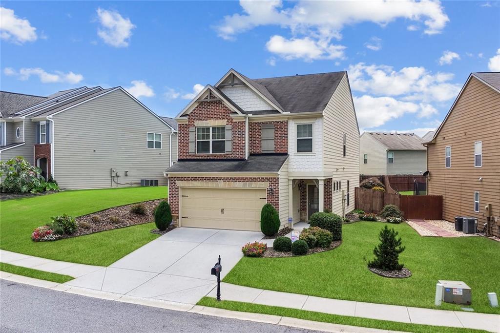 Welcome to 5935 Crestwick Way, a beautifully maintained northeast-facing home in one of Cumming’s most sought-after communities.
Inside, you’ll find the highly desirable floor plan with spacious open living areas and tasteful finishes. The owners have taken exceptional care of the home, ensuring it is move-in ready for its new owner! From the brand-new upstairs carpet installed in summer 2025 to the upgraded brand-new HVAC system, and well-maintained landscaping, every detail reflects a pride of ownership. The kitchen offers ample counter space, stainless steel appliances, and a seamless flow into the family room—perfect for entertaining or quiet nights in. Upstairs, the generously sized bedrooms provide comfort and privacy, with the primary suite serving as a true retreat. Extra upstairs space is currently being utilized as an office and could easily accommodate a playroom or reading nook. Enjoy the peaceful backyard in one of the neighborhood's largest lots, complete with mature Bermuda (maintained by a custom four-zone sprinkler system) and a lovely patio ideal for morning coffee or weekend gatherings. This active community's amenities are incredible, with a clubhouse, pool, playground, tennis/pickleball courts, and a half-court basketball court. Take advantage of the neighborhood’s convenient location with top-level dining and shopping at Forsyth's Collection and Halcyon. Complete with top-rated schools and proximity to GA-400, this house will not last long!. Come see for yourself all this home has to offer- schedule your showing today!