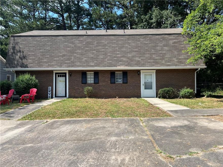 Excellent Investment Opportunity. This 2-story duplex is located in one of the best and most convenient areas in Marietta -- right near Marietta Square. You are close to everything - beautiful Laurel Park is steps away, and you're blocks-away from grocery stores, convenience stores, gas, and dining. Marietta Square is less than two miles away. Each unit has 2 BR, 1.5 BA, double vanities, a spacious family room that connects to the dinning area. Kitchen includes stained cabinets, counter space, refrigerator, dishwasher, and range. One of the unit features laminate flooring throughout, and the other unit is carpeted. Upper level includes 2 bedrooms, full bath, and washer and dryer connections with plenty of closet space. The main level features an oversized living room, dining room, kitchen and half-bath, and double doors that lead to a patio -- a perfect place to enjoy outdoor grilling. One unit has a long term tenant paying $1250/mo, second unit is paying $1450/mo. If you are looking to add to your portfolio or are a new investor, this is the one. It is fully tenant occupied and cash producing.