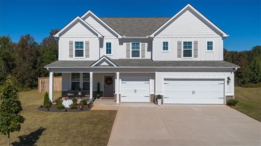 Luxury meets lifestyle in this like-new 5 Bedroom retreat! Tucked away in a quiet cul-de-sac on nearly 2 acres, this home delivers modern elegance, natural light, and an open floor plan that lives as beautifully as it entertains. The main level highlights include a coffered-ceiling dining room, executive trim package, and a versatile 5th bedroom for guests or a home office. The chef’s kitchen features quartz countertops, Samsung Bespoke appliances, and an oversized island overlooking the family room. Upstairs, a spacious loft adds flexibility, and the expansive primary suite offers a sitting area plus a spa-inspired ensuite with stone-core flooring, soaking tub, and walk-in shower. Every inch of this home exudes quality, space, and sophistication. Don’t just dream it—live it. Schedule your private tour today and experience the comfort, elegance, and space this home offers.