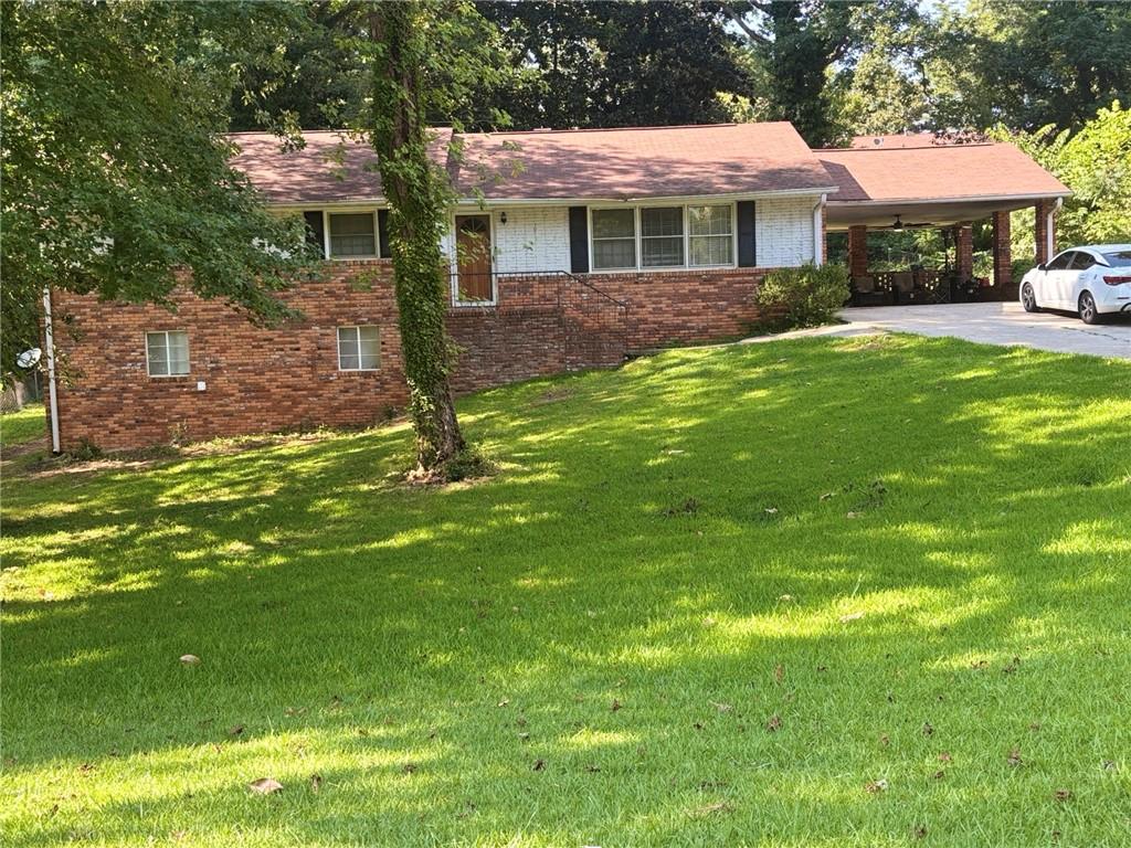 Welcome home to this spacious 3 bedroom, 2 bathroom property, perfectly situated on a generous 0.37-acre lot. This home features a fully functional finished basement complete with 2 bedrooms, a spacious entertainment area, and more-ideal for multi-generational living, guests, or rental potential. While the basement and home may need a little TLC and cosmetic updates, it is full of potential and charm. Located just minutes from the Atlanta Airport and downtown, you’ll enjoy the perfect balance of convenience and privacy. Whether you're a first-time buyer or looking to invest, this property checks all the boxes! Property being sold AS-IS.