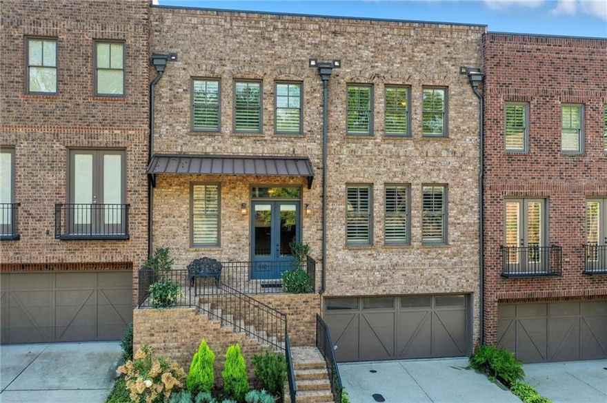 Experience the perfect blend of luxury and convenience in this beautifully maintained three-story townhouse, just steps from the vibrant Canton Street with its amazing restaurants, boutiques, and lively atmosphere.

Upon entering, you are greeted by a bright and welcoming foyer with elegant finishes that set the tone for the home’s sophisticated style. A private elevator provides effortless access to every level. The open-concept main level features a stylish kitchen with Thermador appliances, a 9 ft. island, generous living room with fireplace and built-in bookshelves and double-french doors to a private office.  The basement is completely finished with a full bathroom, built-in shelves and a complete wet bar.  Double-french doors lead to a charming private courtyard with a peaceful water feature befitting of an al fresco meal or morning coffee.  Upstairs the primary features two sets of double-doors, jacuzzi tub and generous primary closet.  Two additional bedrooms, each with its own full en-suite bathroom, ensures comfort and privacy for all.  The two-car garage offers a unique separate temperature controlled storage area. Invite friends as there are two full parking spaces at the home with guest parking directly across the street. 
Well cared for and thoughtfully appointed, this townhouse delivers the ease of low-maintenance living in one of the area’s most sought-after locations. Enjoy the best of city living with a warm neighborhood feel—just moments from everything Canton Street has to offer.