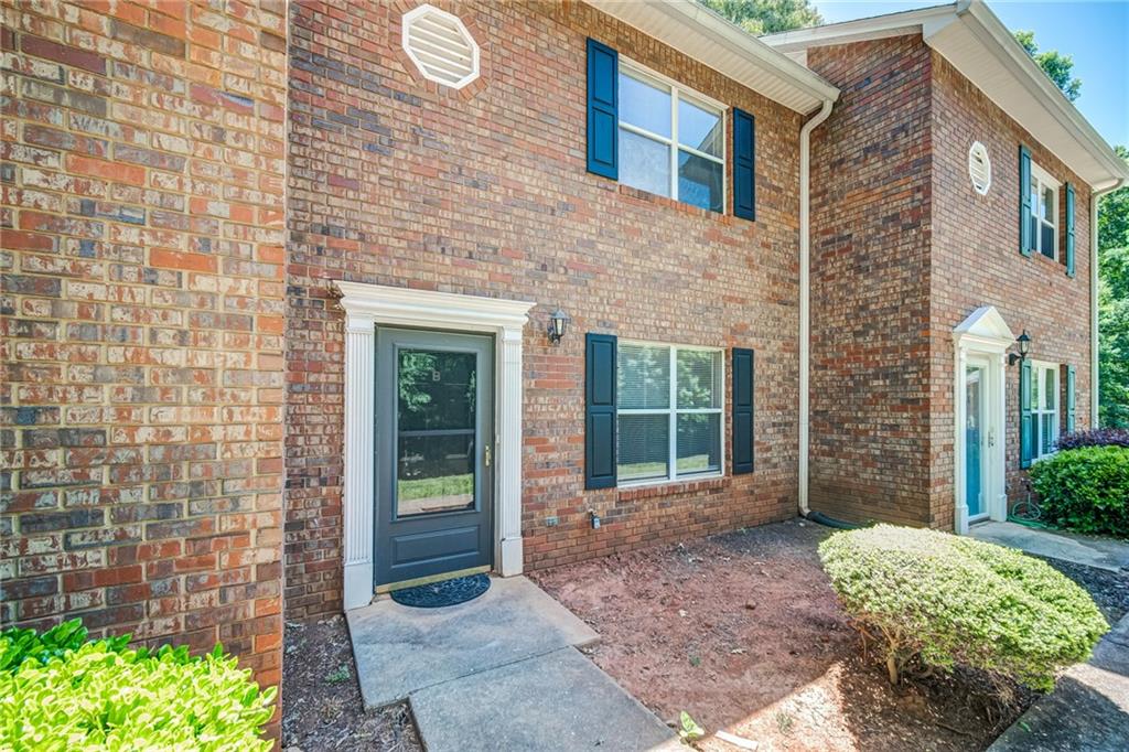 Discover comfort and convenience in this beautifully maintained 2-bedroom, 1.5 bath townhome located in Gainesville, GA. With thoughtful features and a welcoming layout, this home is perfect for anyone seeking a cozy, low-maintenance and private lifestyle.
Two spacious bedrooms with ample closet space. One full bathroom upstairs and a convenient half bath on the main floor. Bright kitchen with plenty of cabinet storage. Private back patio, perfect for relaxing or entertaining. Central heat and air conditioning. Unit B is located to the left of drive way -middle unit.